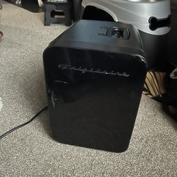 Black Frigidaire mini fridge