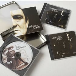 Johnny Cash in collectible tin - 2 music CDs and The Pride of Jesse Hallam DVD 1981 Movie and a mini biography book - gently used condition 