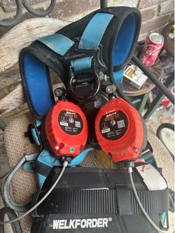 Safety harness with class two safety lanyards
