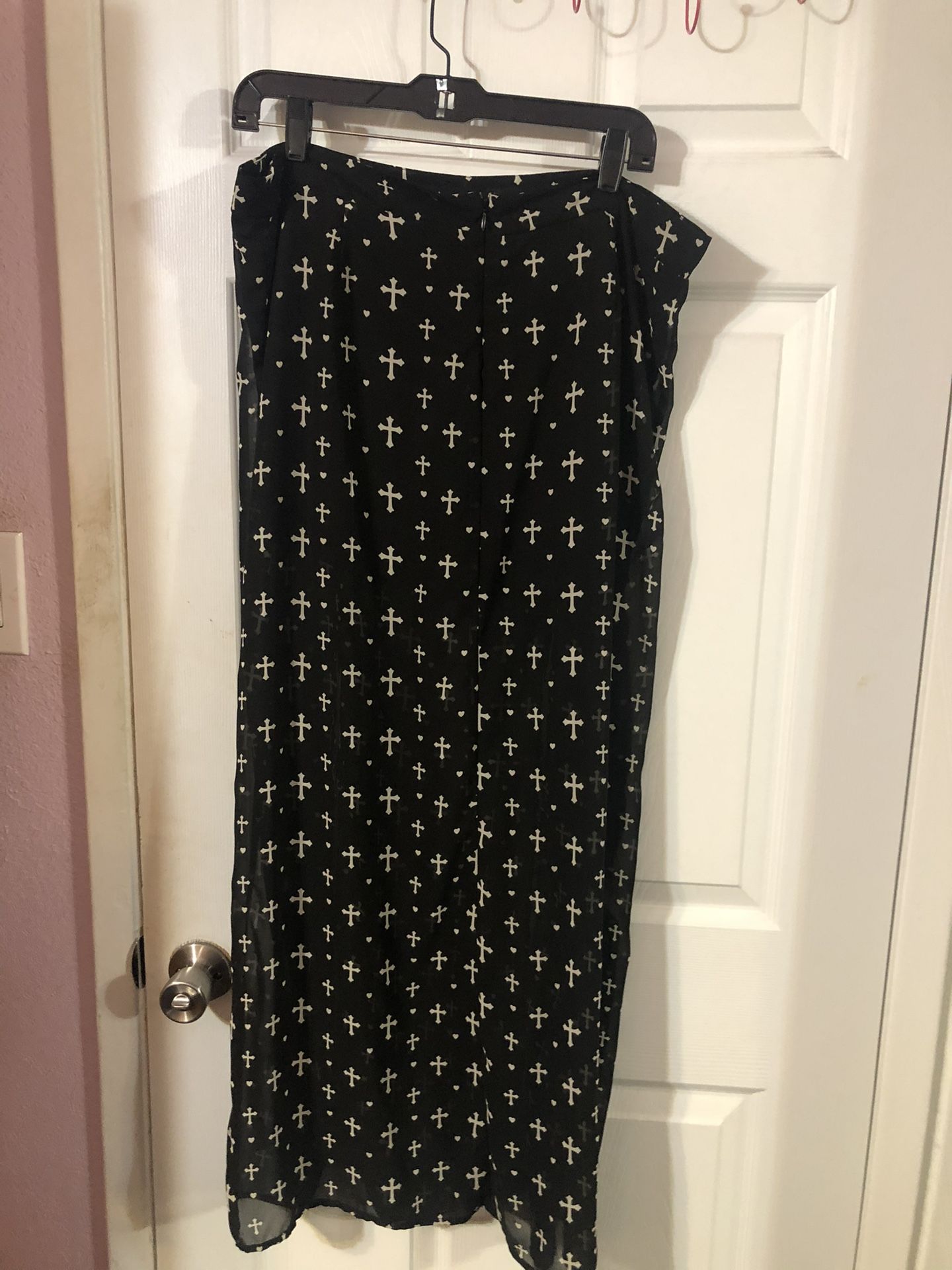 Ladies Women’s Size XL Fun & Flirt Black with White Crosses Print. Long Maxi Skirt with attached shorts the legs are see through.
