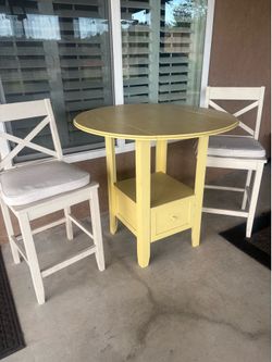 Table with High back Chairs