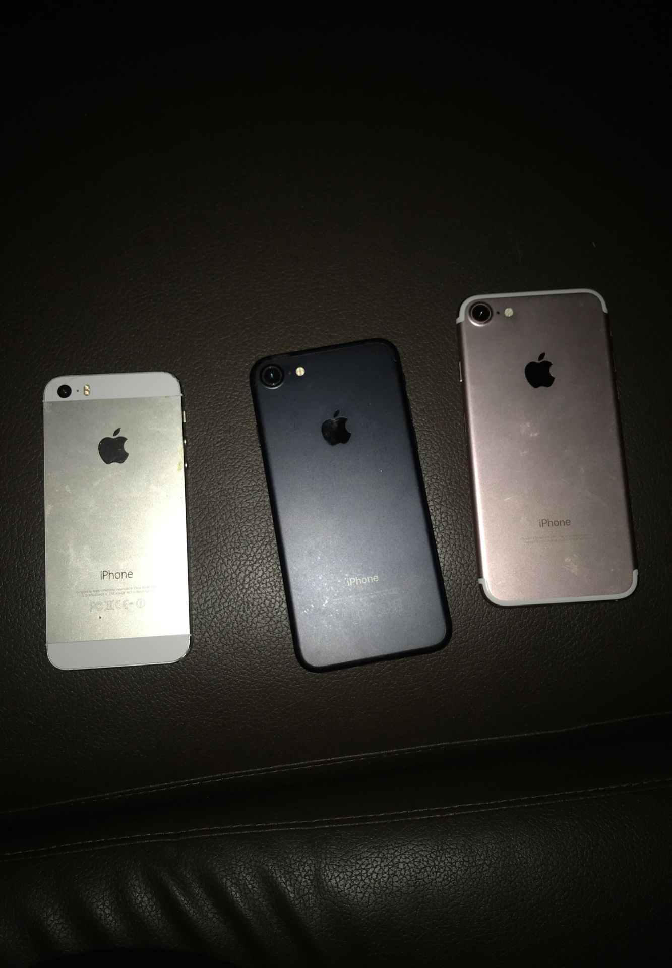 Two iPhones 7 and one iPhone 5