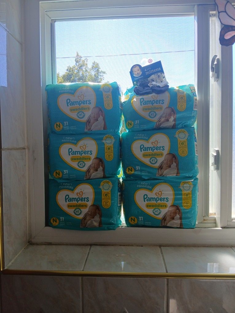 PAMPERS NEWBORN DIAPERS 5 PKS. OF 31 PKS...BRAND NEW $65 ( FIRM PRICE )