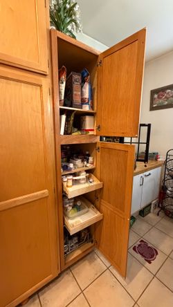 Tall Oak Kitchen Pantry Cabinet with Pull-Out Shelves