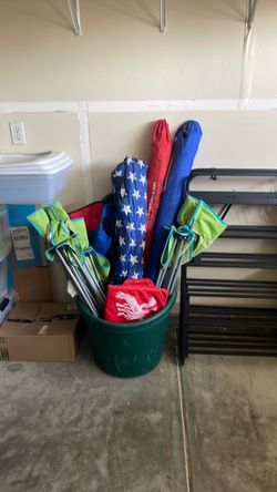 Outdoor chairs, umbrellas, cart