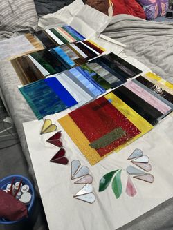 46 pieces of stained glass summer half piece, half sheets and all the tools to do stain glass