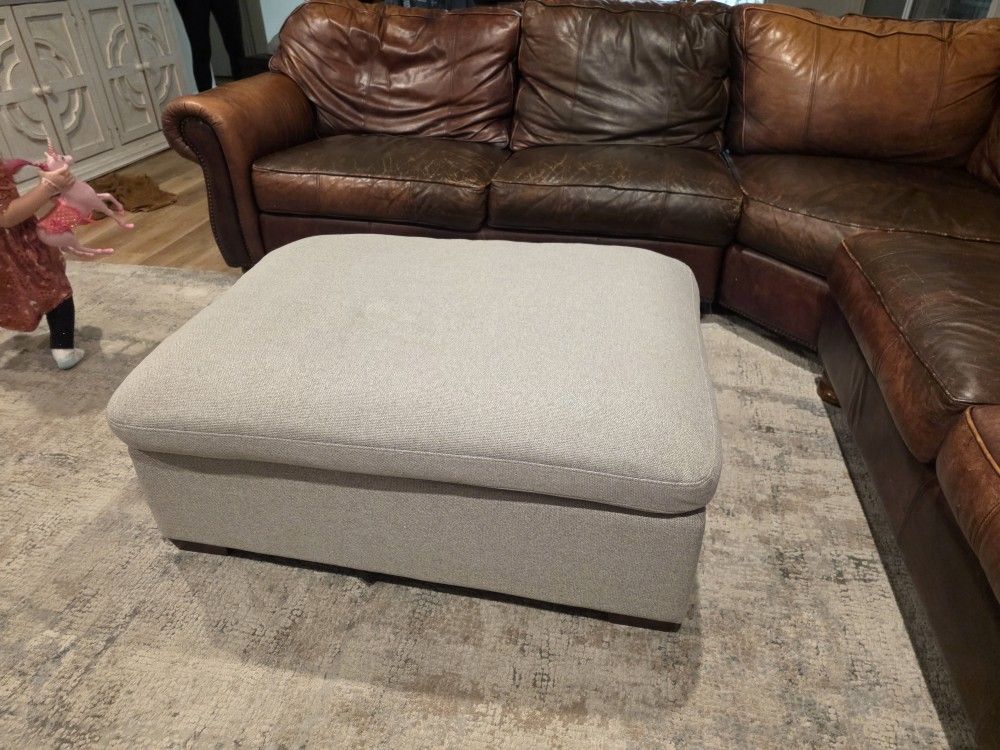 Brown Leather Sectional Couch And Fabric Ottoman