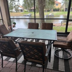 Elegant 7-Piece Patio Dining Set – Glass Top Table + 6 Cushioned Chairs (2 Swivel!)