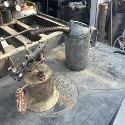 Torch And Oil Dispenser