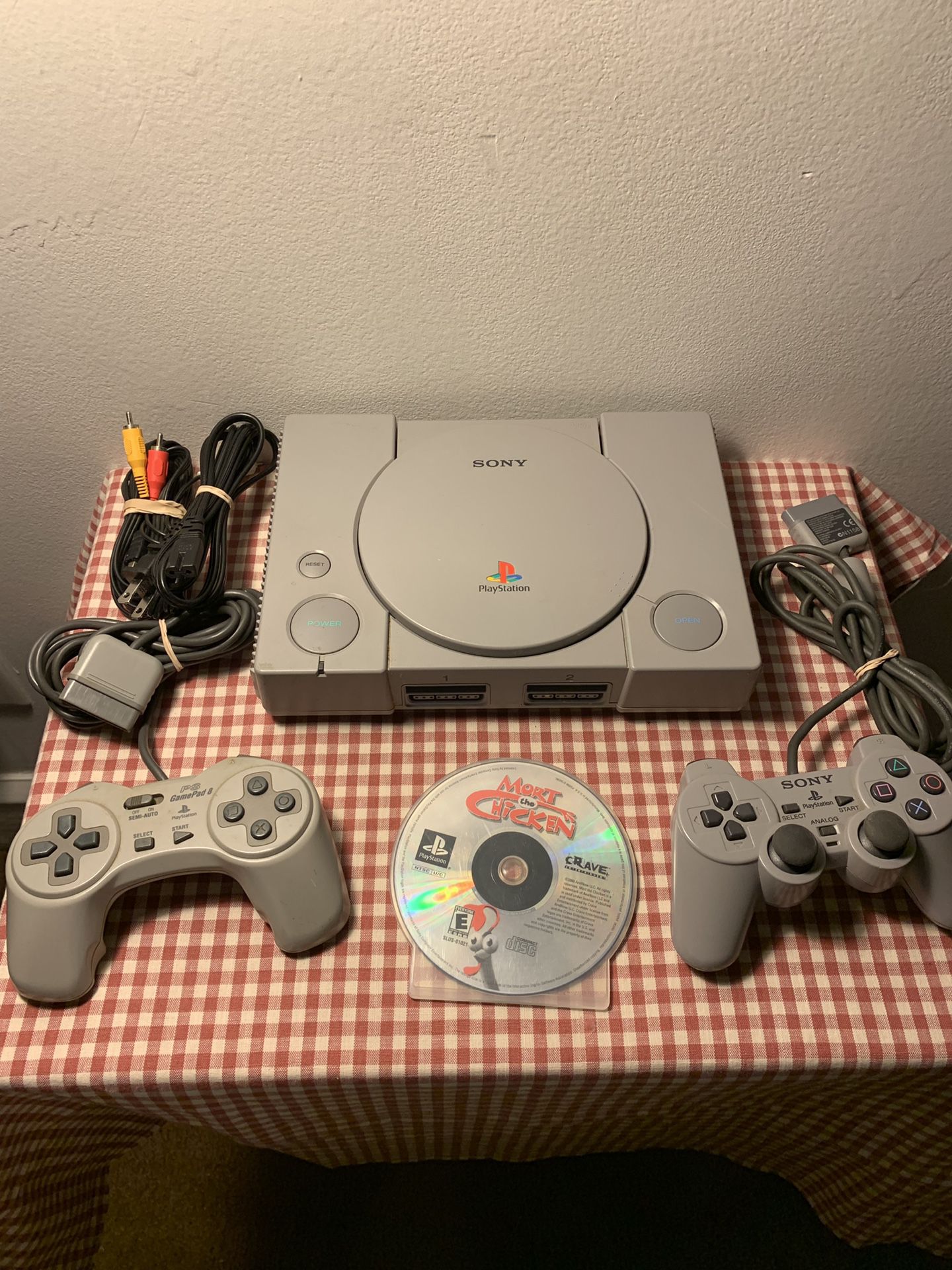 PlayStation 1 PS1 Sony console with two controllers and game