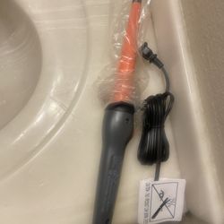 Flat Irons And A Wand 