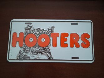 Vintage sealed metal hooters license plate