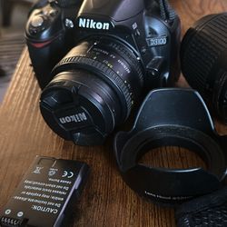 Nikon D3100 camera, Nikon 50mm lens, Nikon DX 55-200mm lens, filter kit and Cirrus carrying case