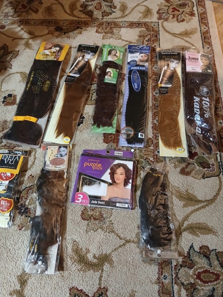 Multiplie packs of hair extensions or braiding hair