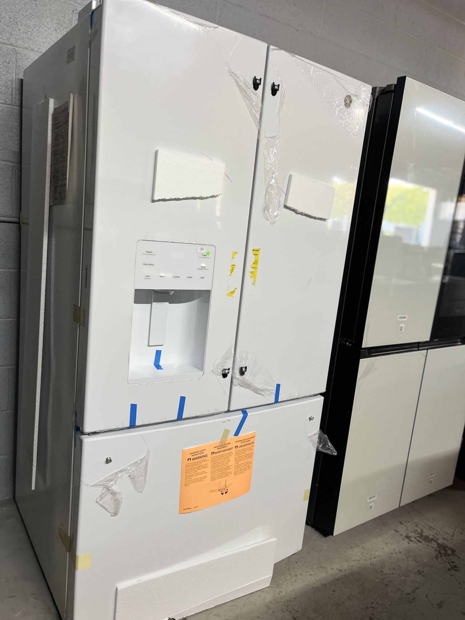 GE ENERGY STAR 25.7 Cu. Ft. French-Door Refrigerator In White.