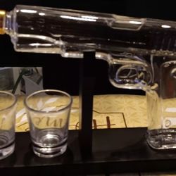 Whiskey Decanter Glass Pistol and two Glass Cups and stand