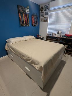 Like new full sized bed! Novaform mattress and IKEA bed frame with storage