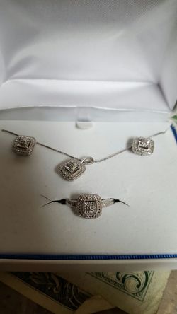 Nice silver ring, earrings, and necklace with real diamonds