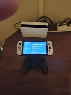 Switch Oled + pro controller/ mem card.