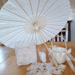 Flower girl accessories silk basket, faux flower petals & paper parasol

Condition for all items is used
$20 for any two items or bundle more to save
