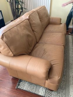 Peach color, leather couch brand new