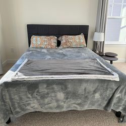 Upholstered queen bed with Ashley memory foam mattress