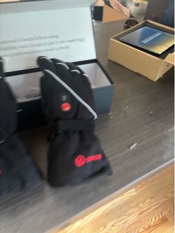 Savior electric gloves.  New in box