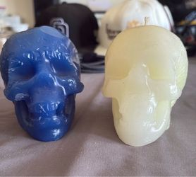 23 big skull candles blue and white