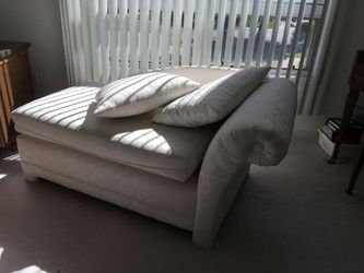 White fabric chaise lounge sleeper chair