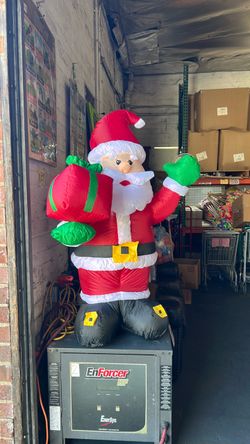 Santa Claus Inflatable Holding a Christmas Gift, approx