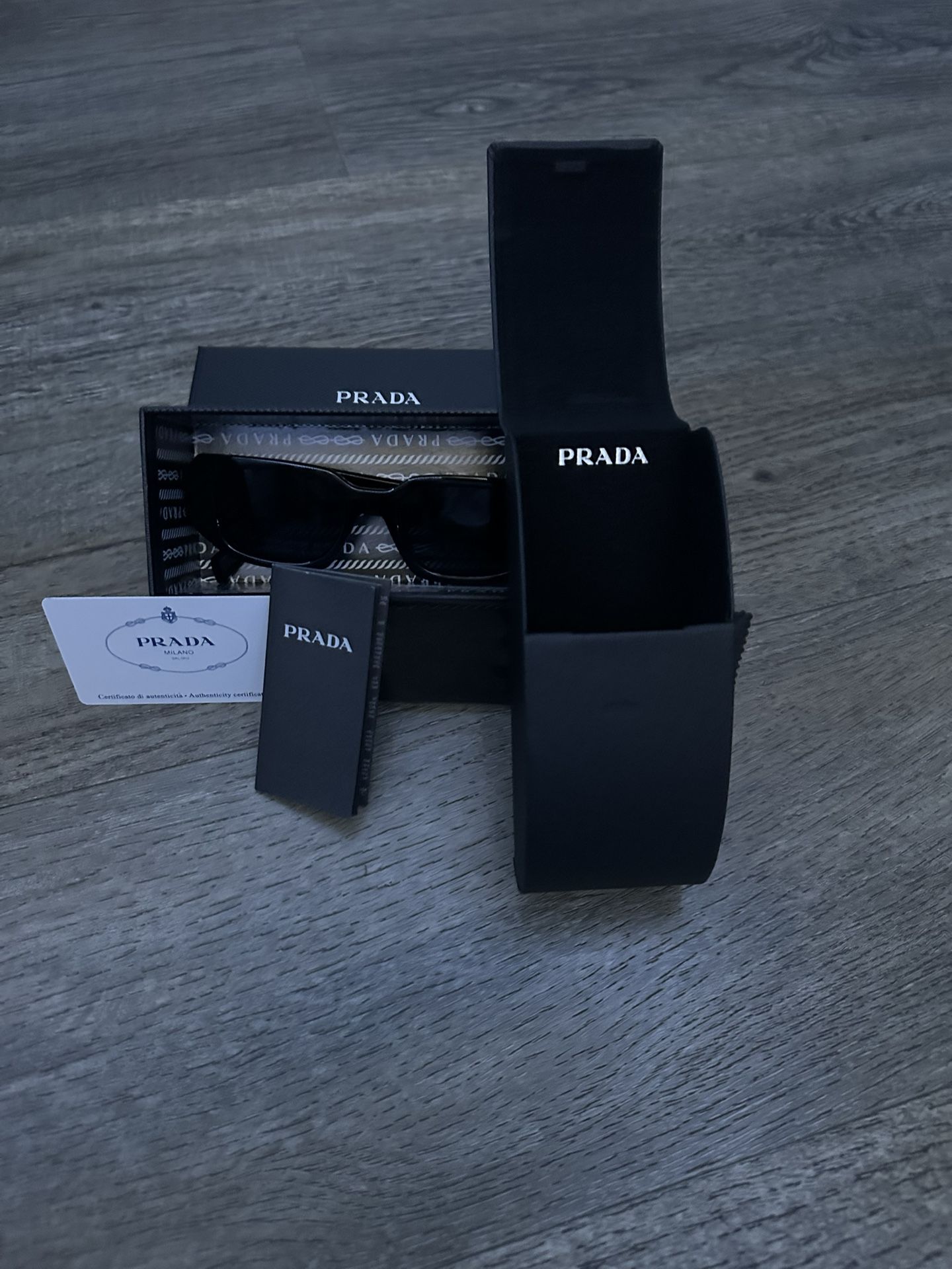 Black and Silver Prada Sunglasses.