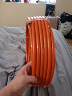 100 foot Orange Oxygen Barrier PEX Tubing (typically 1/2-inch diameter).