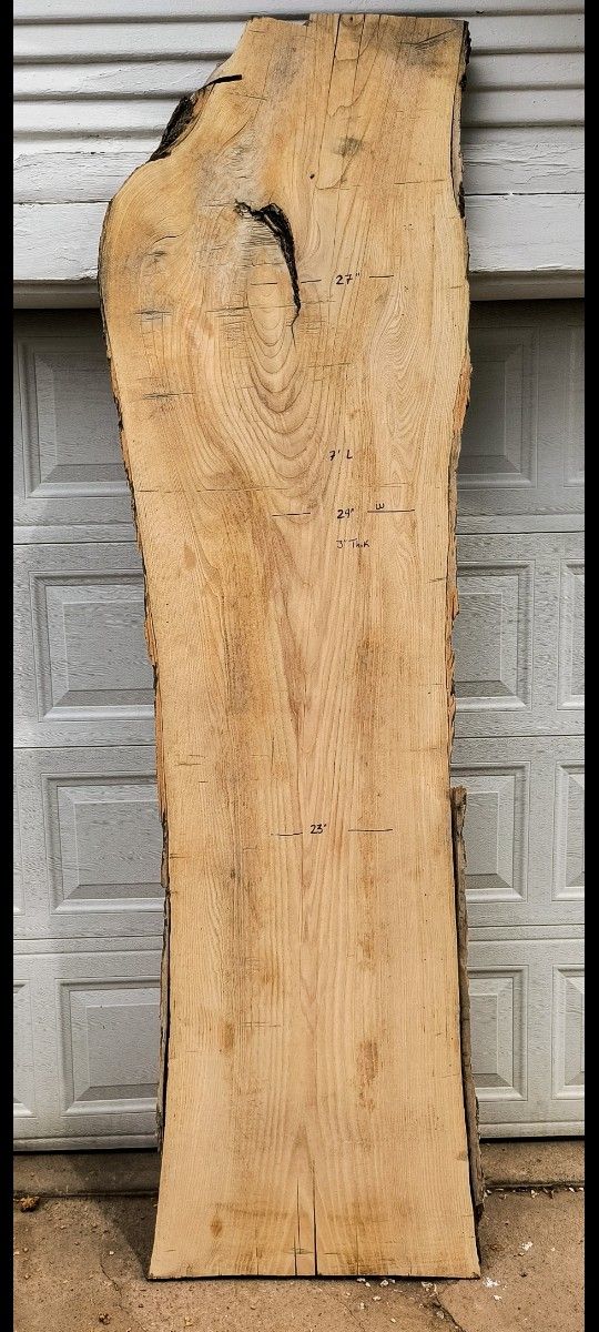 27" wide 7 ft long live edge hard wood slab