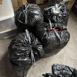 Sorted Bags Of Men’s Clothes 
