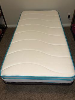 Twin mattress and foldable frame
