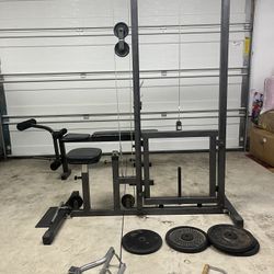 Home gym lat pulldown row machine and bench press