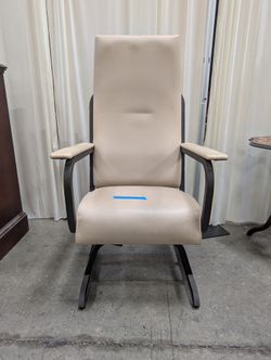 Cream Upholstered High-Back Chair with Metal Frame