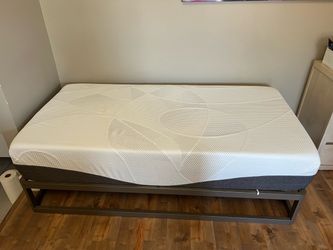 Almost new twin size bed frame and mattress