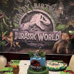 Jurassic World Birthday Banner With Set Of Green Leaves.