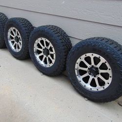 New 18X9 Black/Machined Rims 275 70 18 Goodyear M/T Tires *6X135*FORD* - $1,700 (Aurora)
