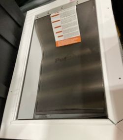 Telescoping large pet door