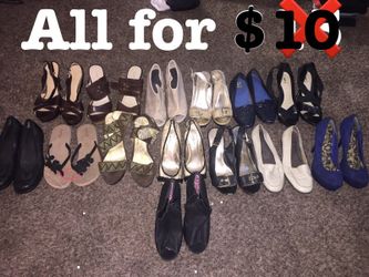 14 pairs of woman shoes size 7-8
