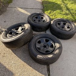 245 55 R18 Tires With Black Steelies