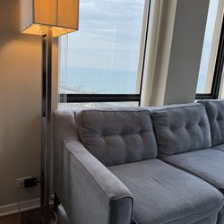 Grey Couch With Auto Reclining Seats and Built-in Chargers
