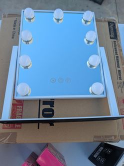 Make-up lighted mirror