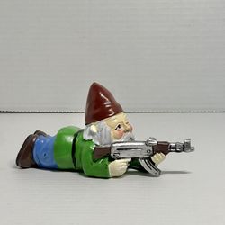 Garden gnome with rifle