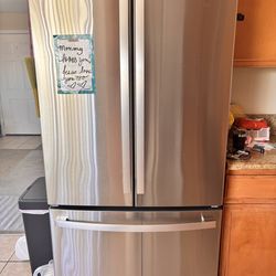 GE counter-depth 21.9 - cu ft 3-door 36 inch wide French door refrigerator with water dispenser