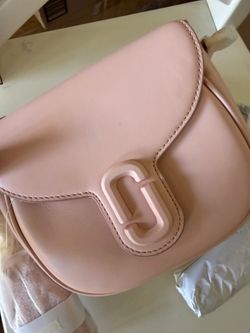 Brand new with tags — never used, still in original packaging. Strap still wrapped in plastic.