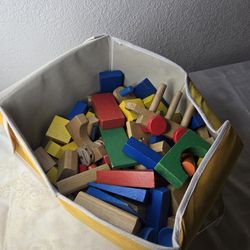 Kids play wood blocks .motor skills