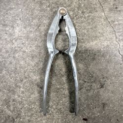 double-jaw metal nut and seafood cracker. 